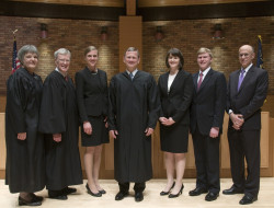 From left: Judge Brown, Judge O'Scannlain, Maggie Hall, Chief Justice Roberts, Meredith Price, Andy Erickson, and Dean Klonoff