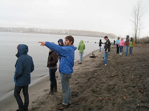 Students perform fieldwork at the terminus of the Columbia Slough, a narrow waterway formed by the Columbia River.