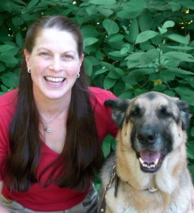 Sara Chambers and Tex with big smiles after they passed the Delta Society test to become a therapy dog team.