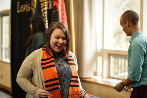 TCK Student Life Intern Anri Nick Ryan '17 wearing her graduation sash.