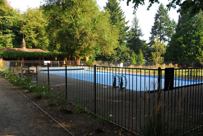 Outdoor Pool with the poolhouse to the north, modern view (note the original pool ladder handles have been maintained)
