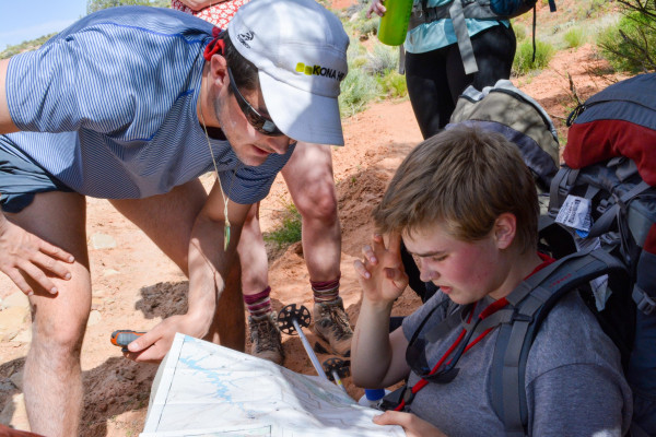 Map and compass skills take time to master in Utah's slickrock canyon terrain.
