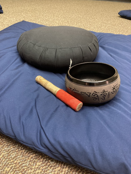 Meditation cushion and singing bowl