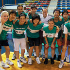 Juli Fulks, Lewis & Clark's women's basketball coach (back row, center) with the Malaysian women's basketball Junior N...