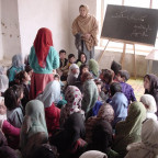 In small village schools such as this one, established by CARE in Shakardara, just north of Kabul, girls have the opportunity to receive ...