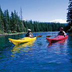 Kyle Miller '10 (left) and Rachael Skinner-Green '10 strike out to kayak Waldo Lake, rated the fourth-clearest lake in the world. This pr...