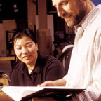 Michael Broide, associate professor and chair of physics, and Traci Harris '03