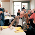 Norm Glenn '55, a member of the 1955 Golden Reunion planning committee, delights the crowd during the Albany Society Breakfast, held May 15.