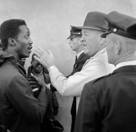 Sheriff Bill Lee (right) slaps Tom Gilmore as Gilmore leads a march to integrate schools. Following this incident, local minister and civil rights leader William McKinley Branch and SCLC staff member James Orange courageously suggested that Gilmore should seek the office himself. Following an initial 1966 defeat (due to voter irregularities), Gilmore was elected in 1970 and served as sheriff of Greene County until 1983. Eutaw, Alabama, 1965.
