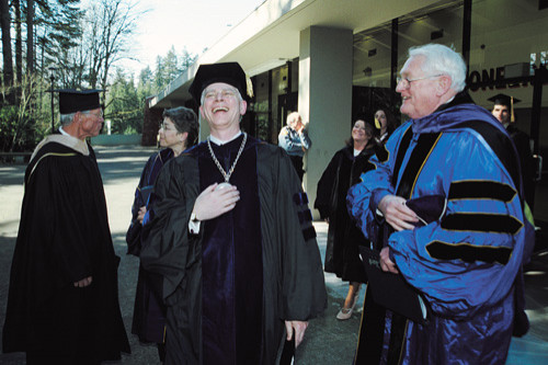 After the ceremony, President Hochstettler shares a hearty laugh with Reed College President Emer...