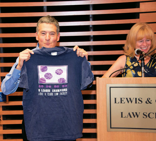 Professor Steve Kanter shares a bit of history in the form of a 1985-1989 B League Champions Lewis & Clark law faculty t-shirt.