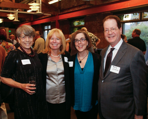 Associate Dean Susan Mandiberg, Dean Jennifer Johnson, Oregon Governor Kate Brown '85, and President Barry Glassner are all smiles at Fri...