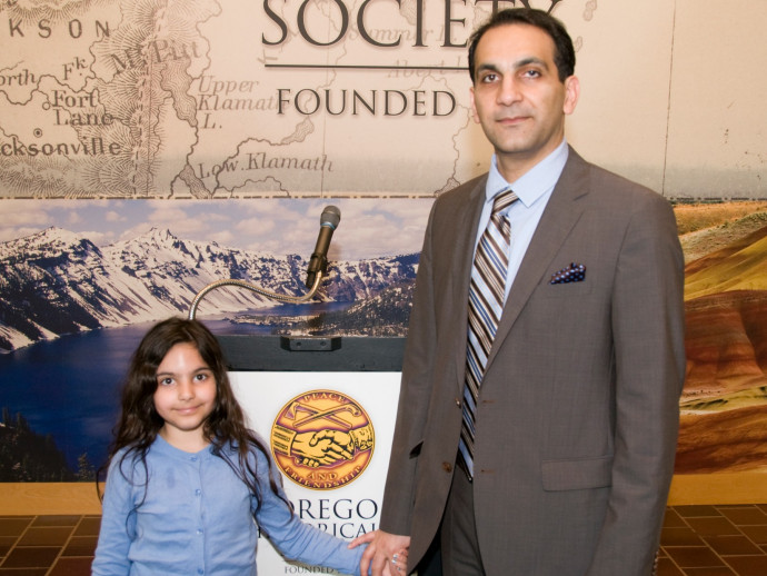 Joyce Ann Harpole Scholarship recipient Reza Alavi '15 and his daughter, Tara