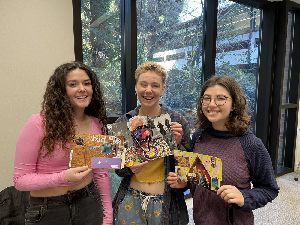 3 women holding their art collages.
