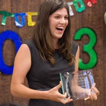 Laura Todis MAT '10 receives the Amgen Award for Science Teaching Excellence. Photo by Vinit Satyavrata, Ventura County Star.