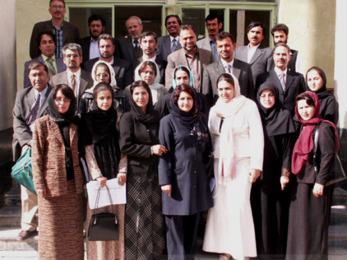 Zaher Wahab (second row on the left), poses with the first cohort of the master's degree for teacher education faculty at Kabul Education...