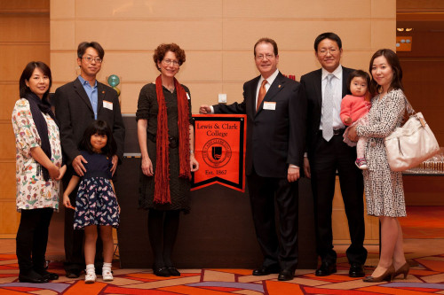 Kei Nagai '97 with family (left); Toshinobu Toyama '97 with family (right).