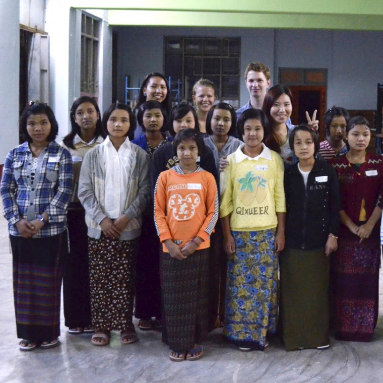 Sam Shugart '15, Nway Khine '15, Katie Schirmer '17, and Ira Yeap '14 with a group of their students in Myanmar.