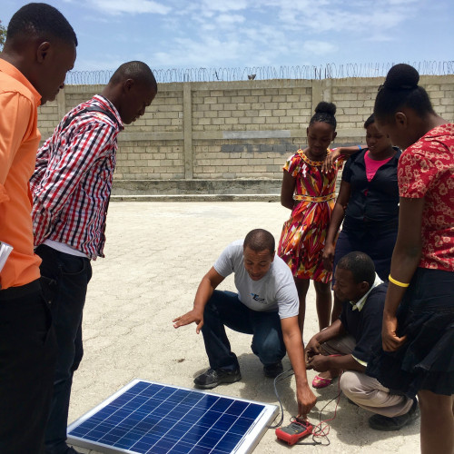Learning about solar technology in Port-au-Prince, Haiti