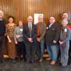 Photo includes some of the employees honored with 20 or more years of service. From left to right...