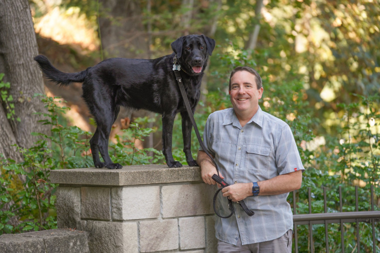 Director of Campus Safety Jay Weitman and his dog Lily