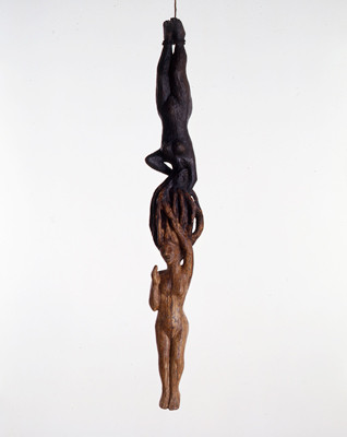 Dark Roots (1999) wood, plaster, tar, rope, and paint, 71 x 9 x 7 inches. Courtesy of L.A. Louver Gallery and the artist.