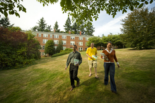 Behind Rogers Hall, the graduate campus lawn is a place where classes sometimes meet, where stude...