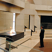 Levinger pauses for a moment of contemplation in the Hall of Remembrance at the Holocaust Museum.