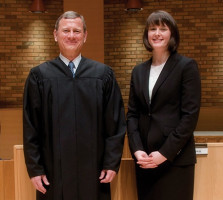 John G. Roberts, Jr., Chief Justice of the United States, and third-year law student Meredith Price, Advocate of the Year.