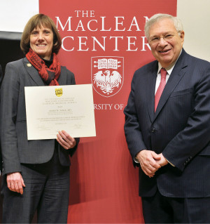 <em>Tolle, recipient of the 2014 MacLean Center Prize in Clinical Ethics, with Dr. Mark Siegler, the center's director.</em>