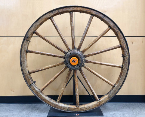 The Wagon Wheel trophy, with a new Lewis & Clark hubcap, on display in the Pamplin Sports Cen...