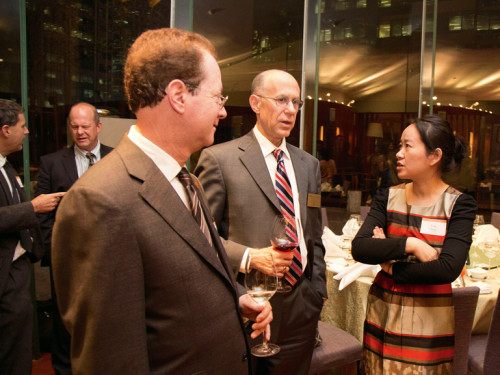 Yan Jiang JD '01 speaks with Robert Klonoff (center), dean of Lewis & Clark Law School, and President Glassner at the Shanghai...