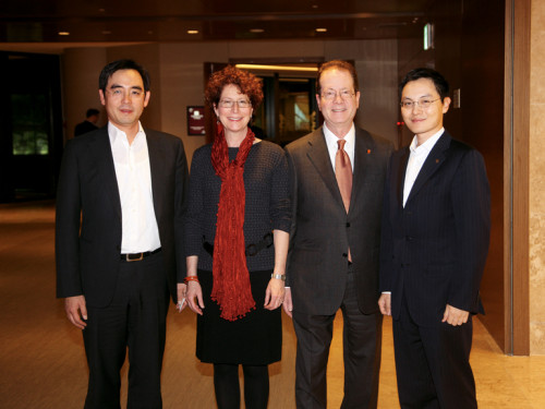 Jung Han Kim BS '96 (left) and his brother, Shin-han Kim CAS '98, enjoy the Seoul alumni event with Betsy Amster and President Glassner.