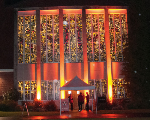 South Chapel, the event venue, illuminated at night.
