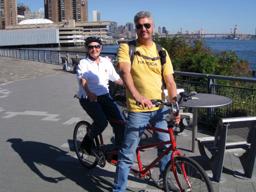 Turner cycling with her son, John Turner, near her apartment in New York City.