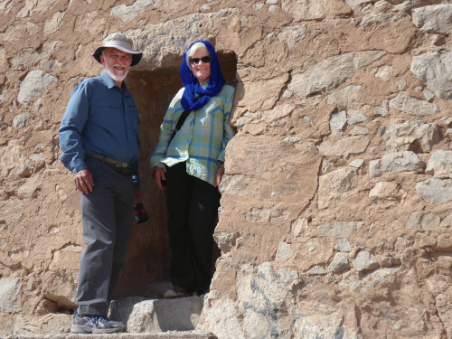 2016: Paul Barker BA '71, MAT '81 and his wife, Nora, in the doorway of a Zoroastrian Tower of Silence near Yazd.