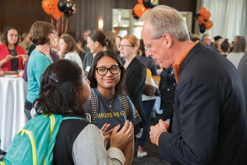 President Wiewel chats with students.