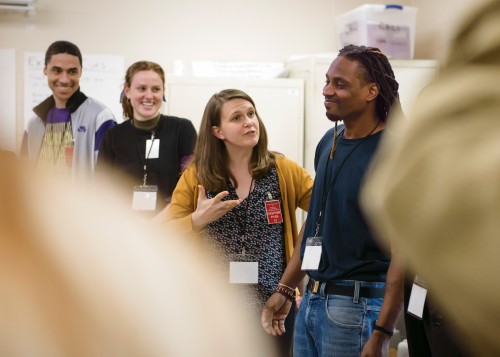 Rebecca Lingafelter (center), associate professor of theatre, helps students prepare a theatre performance for the course.