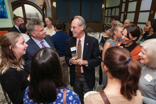 President Wiewel mingles with guests at an alumni event in Washington, D.C.