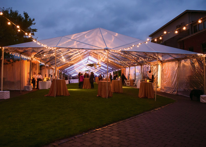 Reception Following the installation ceremony, guests mingled under a tent in the academic quadra...