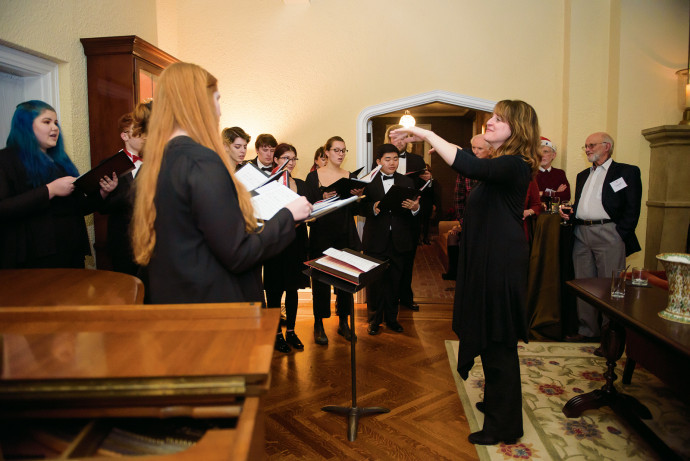 Associate Professor of Music Katherine FitzGibbon conducts Cappella Nova.