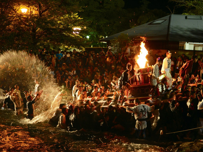 The climax of a fire festival in honor of the Fuji deity.