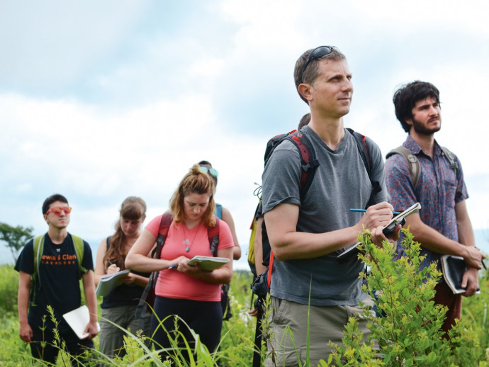 Associate Professor Andrew Bernstein and students conduct field research in area grasslands.