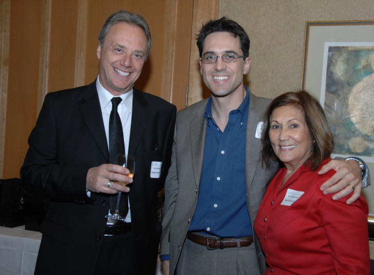 Marc Casto (center) with his mother, Maryles Casto, and Fabio Castellotto, manager of Casto Vacations.