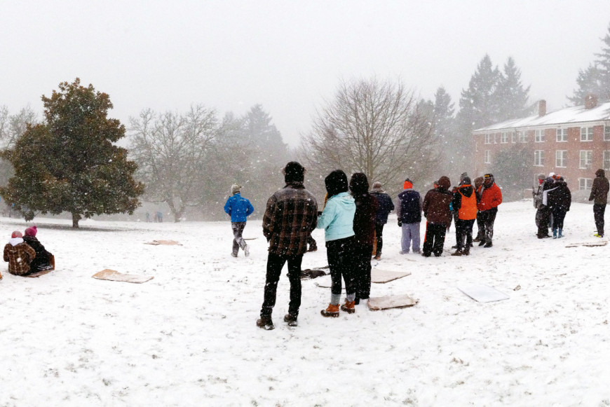 Students in the snow at the graduate school.