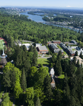 Aerial view of the campus with Portland in the background.