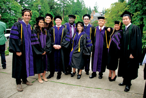 LLM graduates pose for a photo.