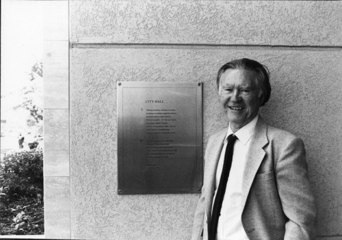 William Stafford with the plaque displaying his poem City Hall, installed at the Lake Oswego City Hall. Taken during the dedication.