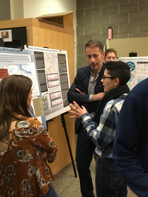 CAS Dean Bruce Suttmeier talks with Climate Science students at the Fall 2018 Poster Celebration.