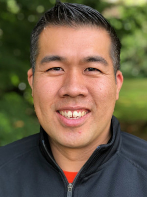 Head Men's and Women's Tennis Coach/Director of Tennis Jimmy Chau